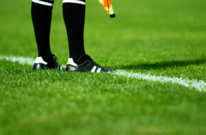 Soccer Referee with flag